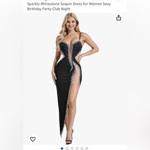 Stunning brand new never worn.Black mesh and rhinestone dress!